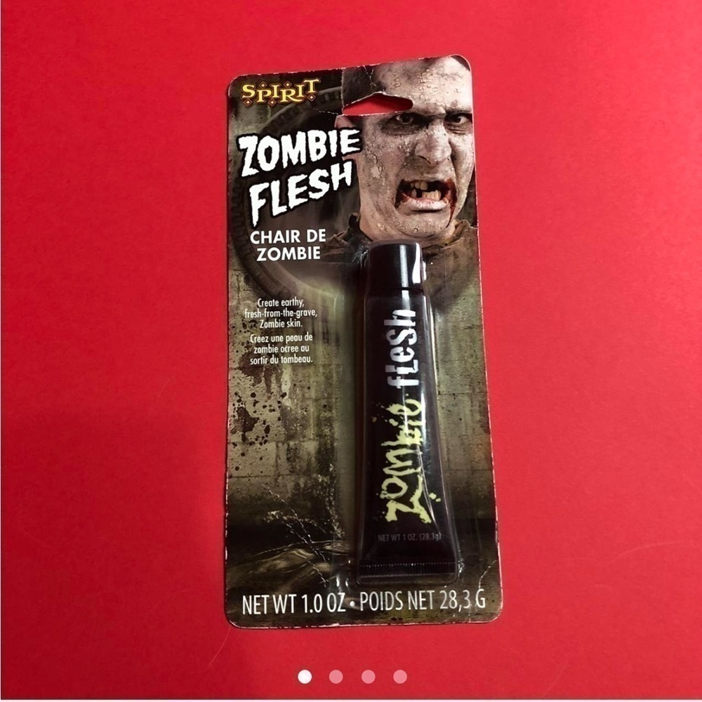 zombie flesh sfx makeup (black fake blood i think). 🖤🖤​​​​​​​​​​​​​​​​​​​